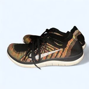 Nike Women's Black and Orange Sneakers